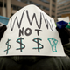 Demonstrators rally outside the Federal Communications Commission building to protest the end of net neutrality rules Dec. 14, 2017, in Washington, D.C.